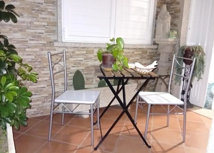 Merchy Combarro Apartman Rial